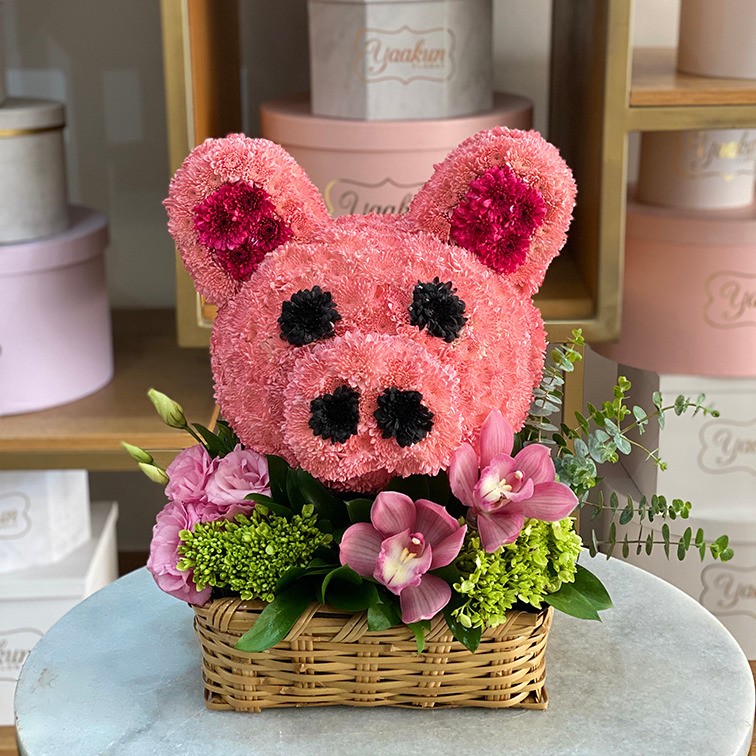 Escultura cabeza de puerquito